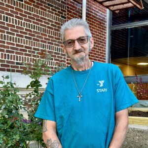 John in the garden area outside of the Reading YMCA
