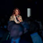 Amy confidently telling her Y story at the Breakfast of Champions