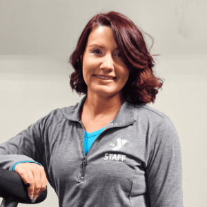 Amy, posing with fitness equipment