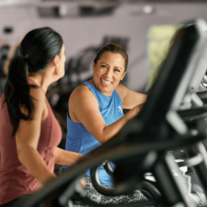 member getting a fitness orientation at the y