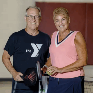 Mifflin YMCA Members Mike and Karen Derr, playing pickleball