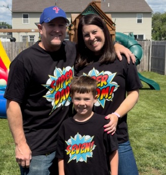 Jack and his parents, Jack loved summer camp at the Y!