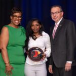 Breakfast of Champions honoree, Beloved Lenora Pair posing with Ken Borkey, President and CEO of the YMCA of Reading & Berks County, and Crystal Gilmore-Harris, YMCA board member.