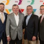 Jesse Whiteman, Executive Director of the Sinking Spring YMCA, pictured with Richard Auman, Ken Borkey, and event guests during the 2026 Breakfast of Champions for Youth.